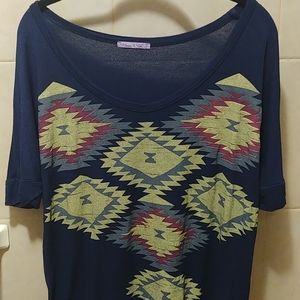 Dark blue shirt with yellow and purple design